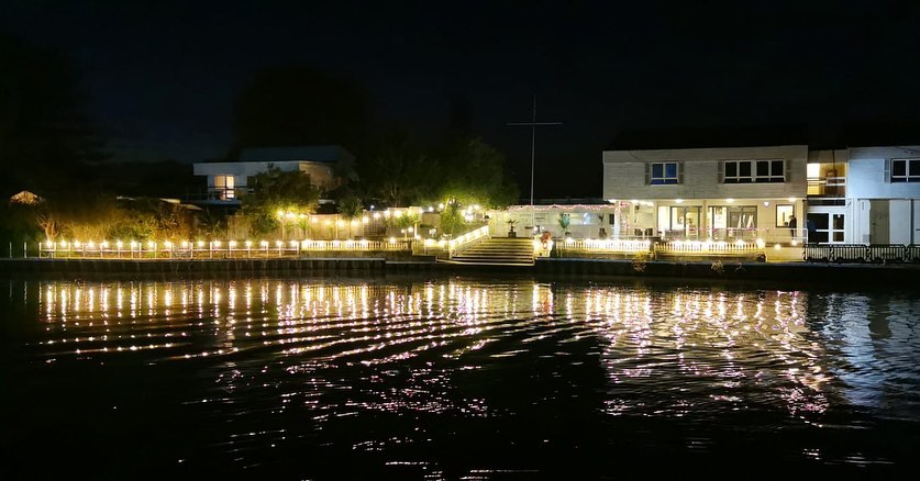 Ravens Ait island in Kingston at Christmas decorated with lights