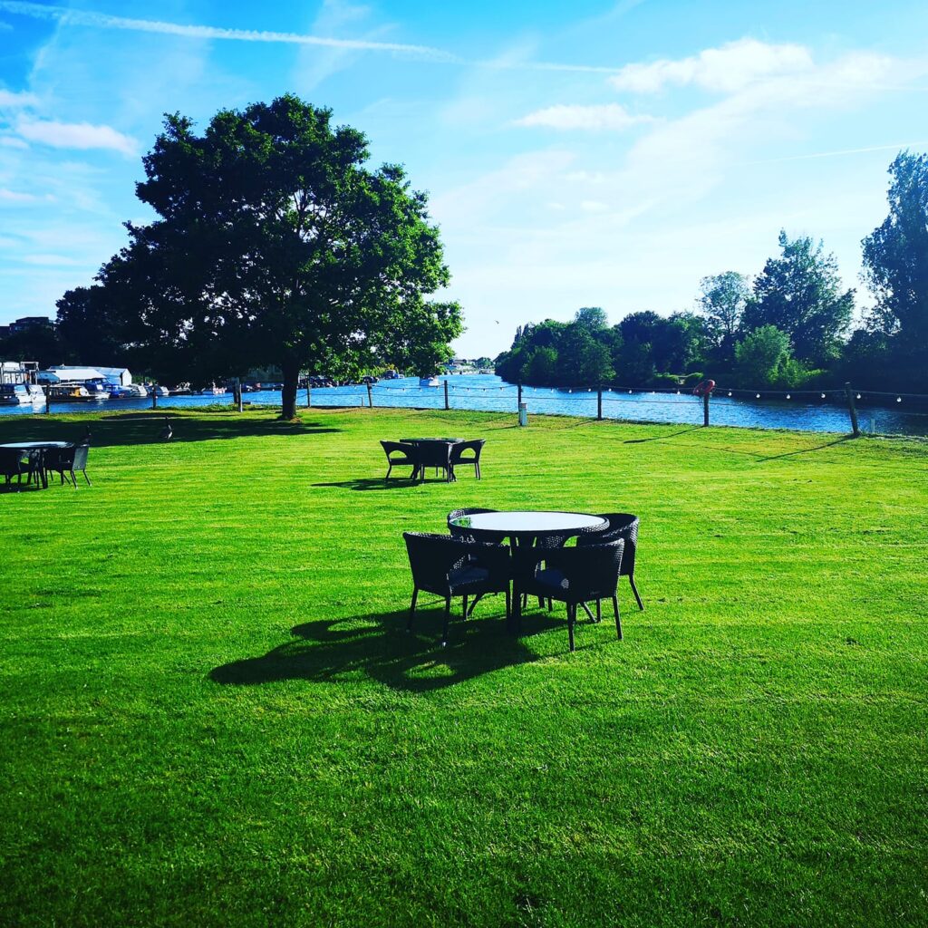The lawn at Ravens Ait on a private island with an incredible view of the Thames where the Wimbledon Tennis will be shown on a big screen