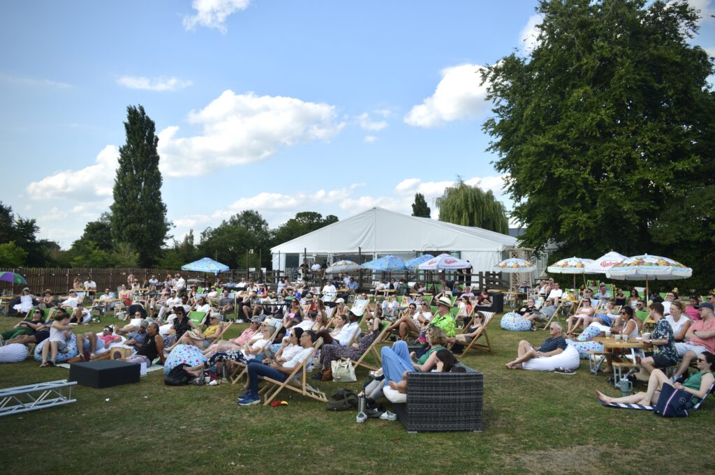 People enjoying a day out on Ravens Ait island in Kingston 